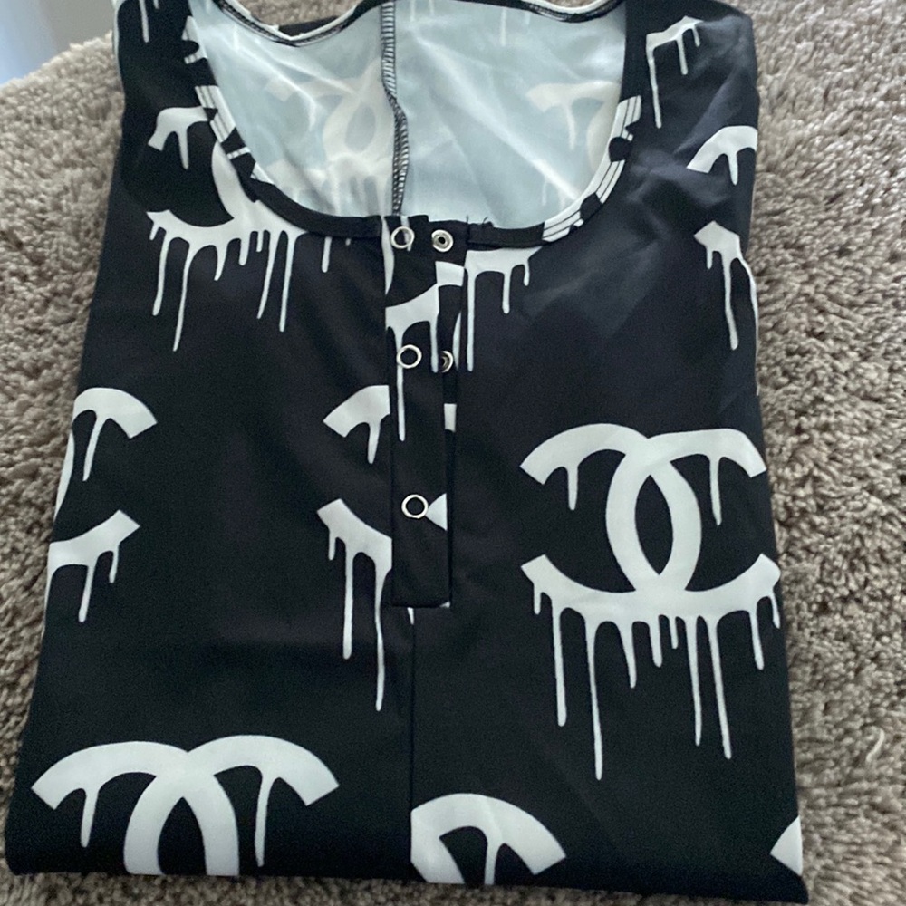 Romper Chanel black with white logo